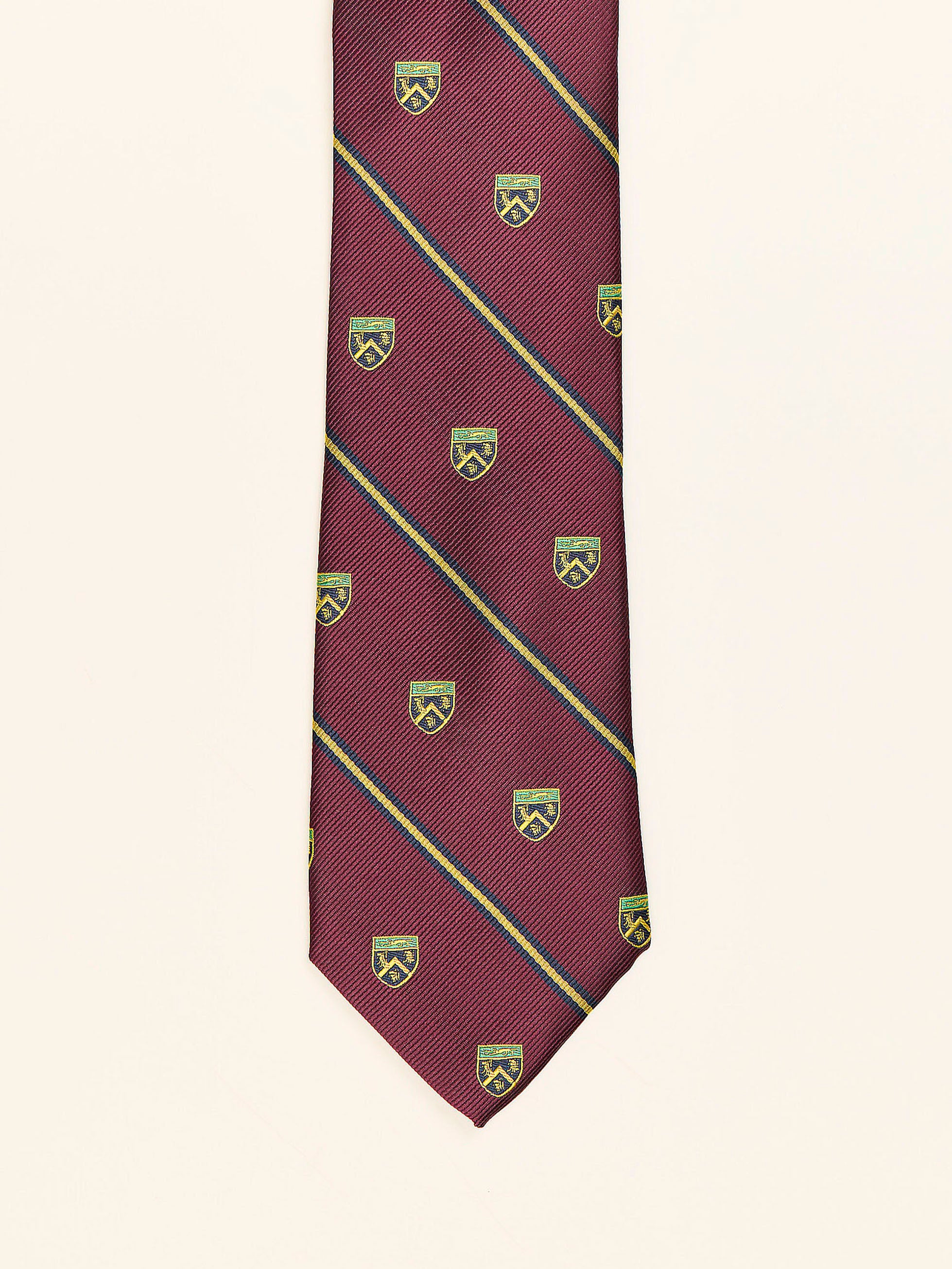 CORBATA RAYAS CON ESCUDO BURDEOS